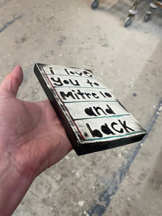 I love you to mitre 10 and back tile.