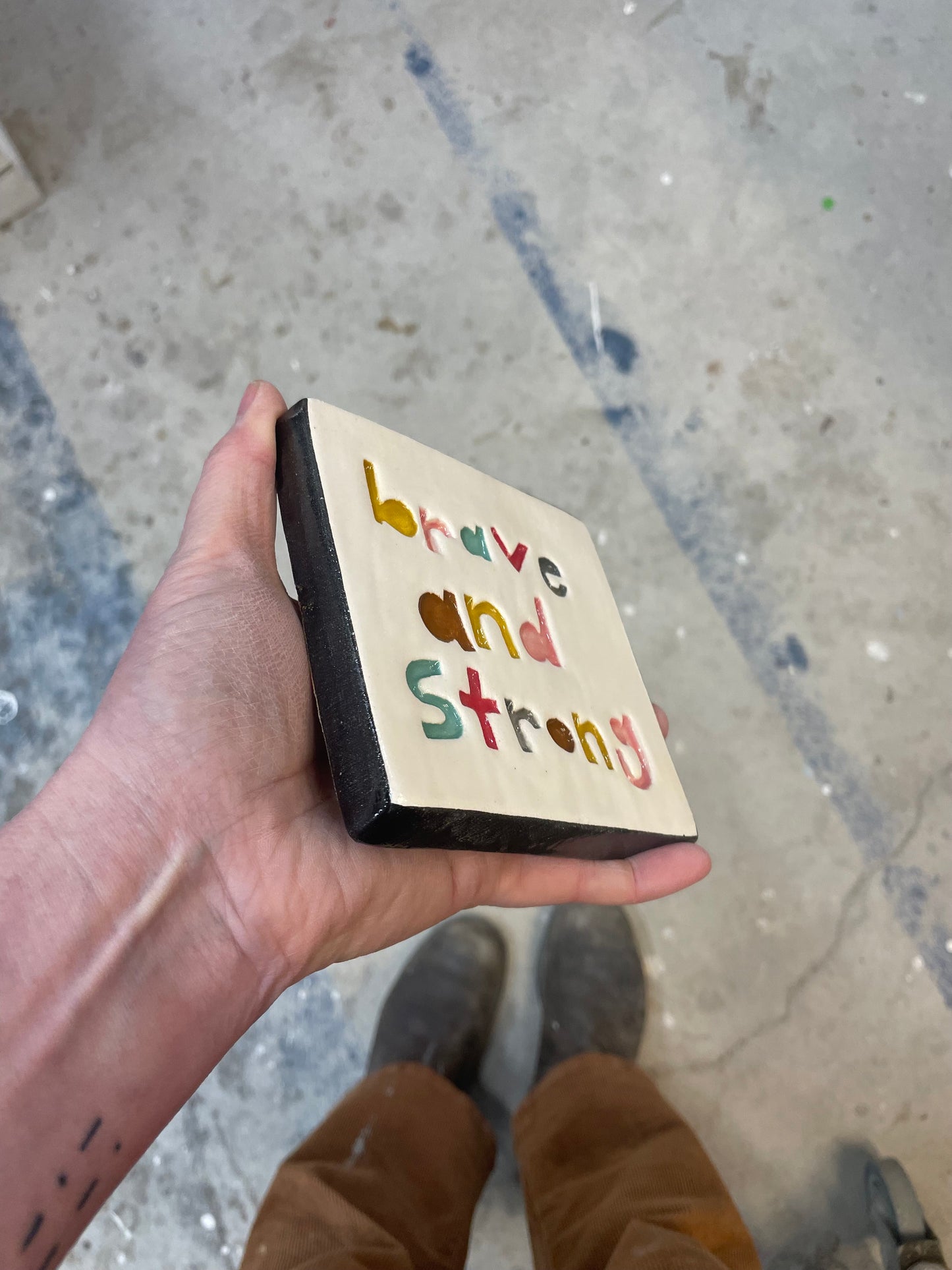 Brave and strong tile