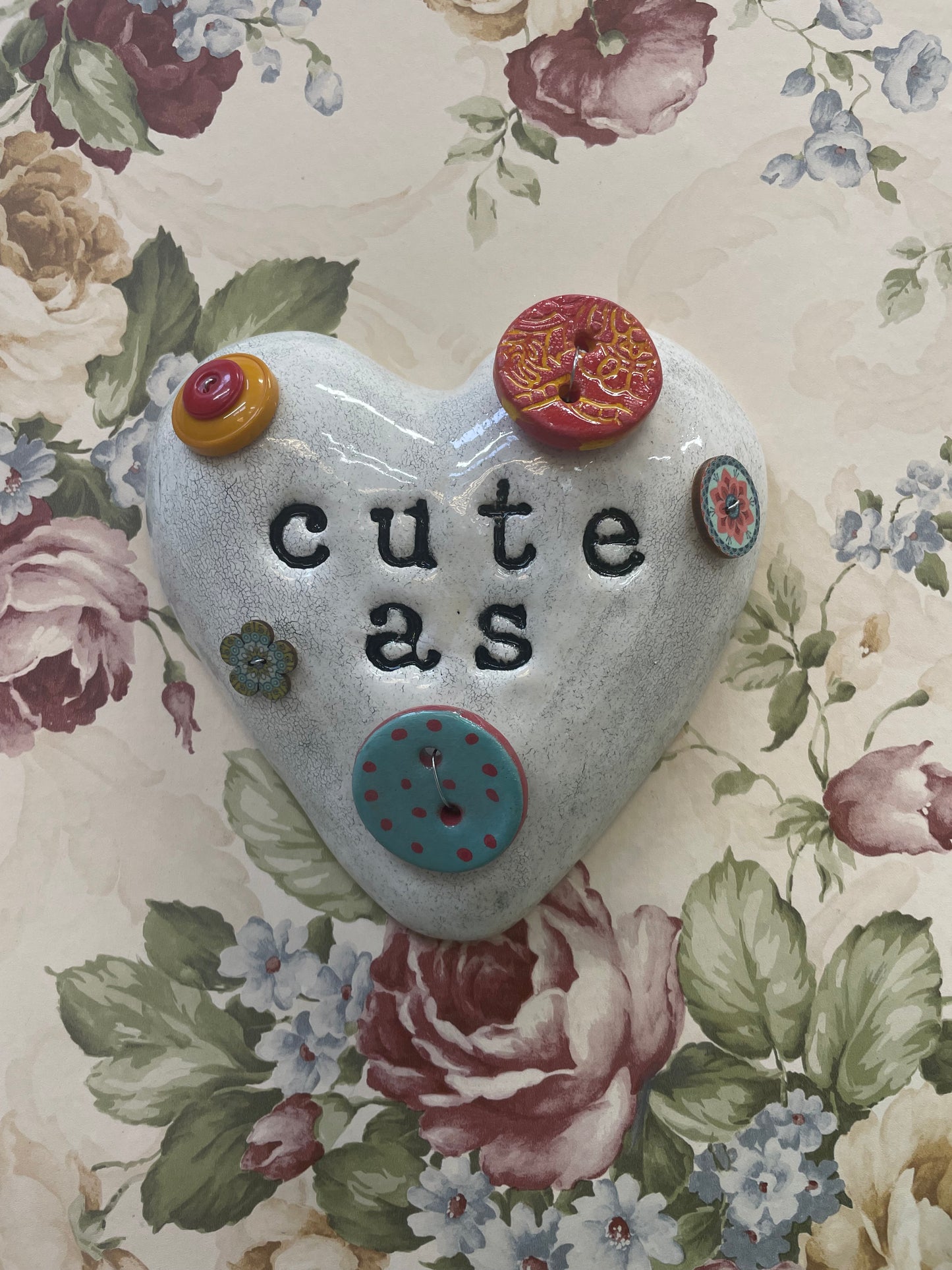 Cute as a button wall heart.