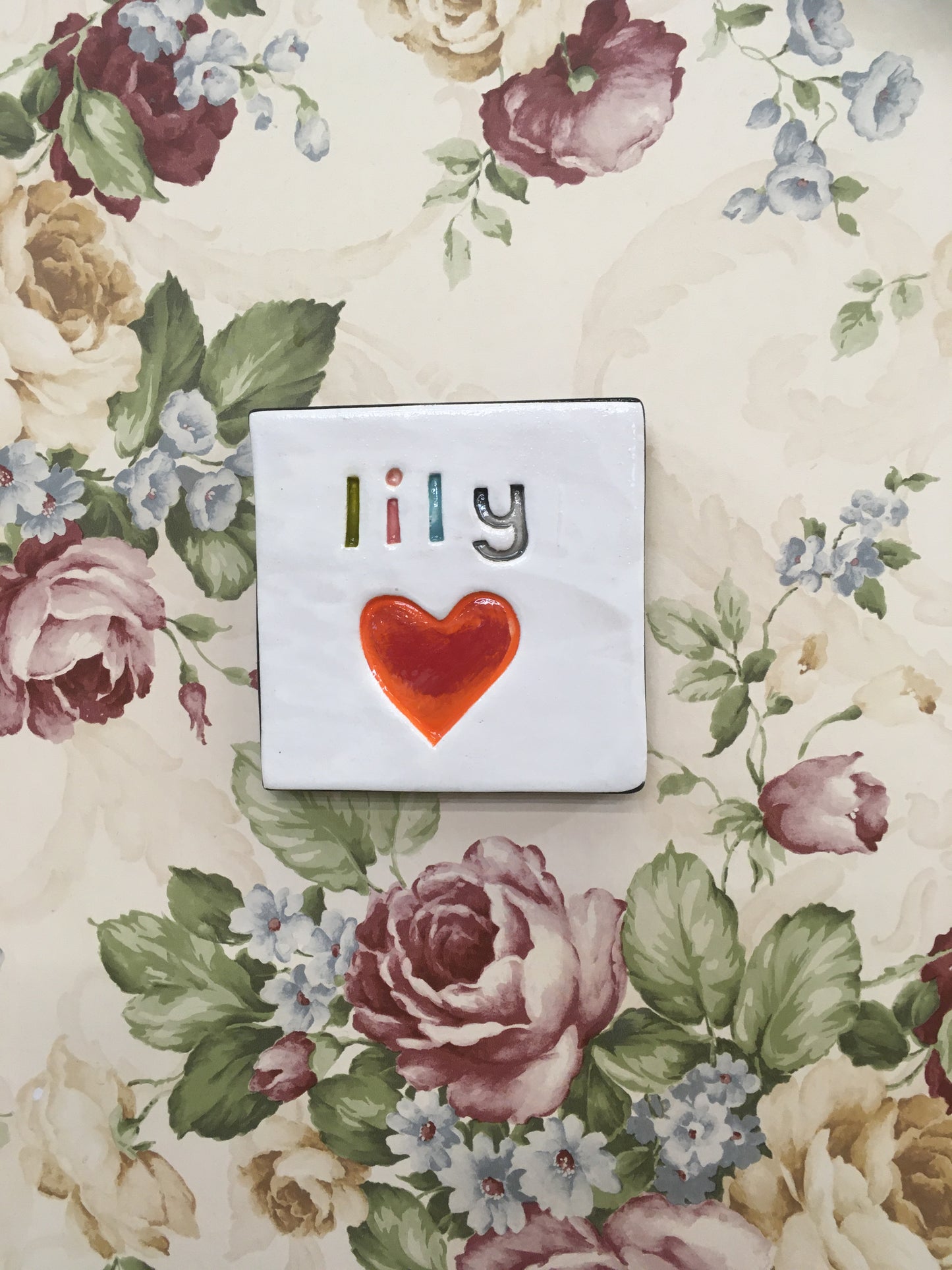 Custom name tile