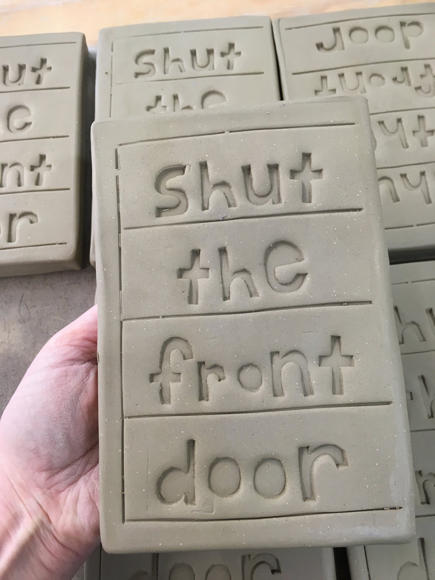 Shut the front door tile.