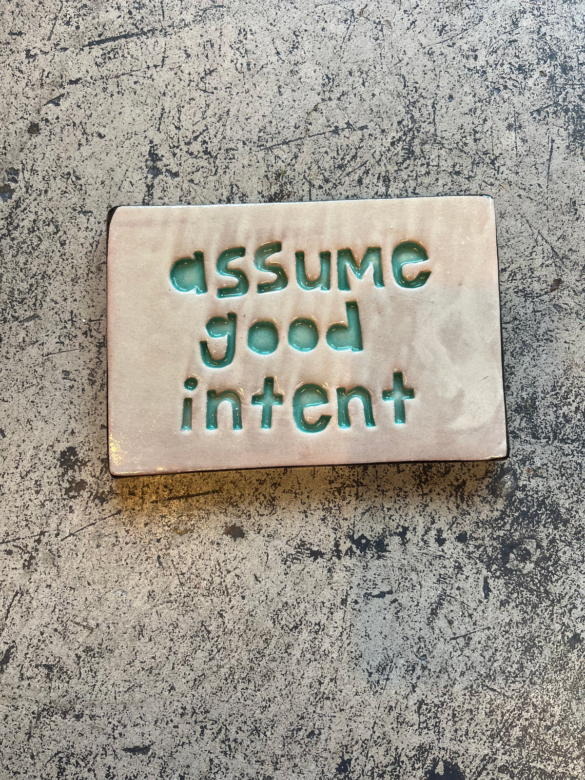 assume good intent tile