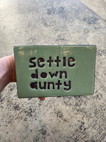 Settle down aunty tile