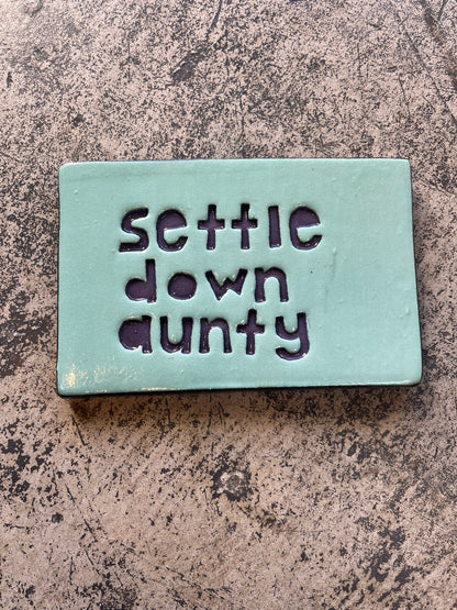 Settle down aunty tile