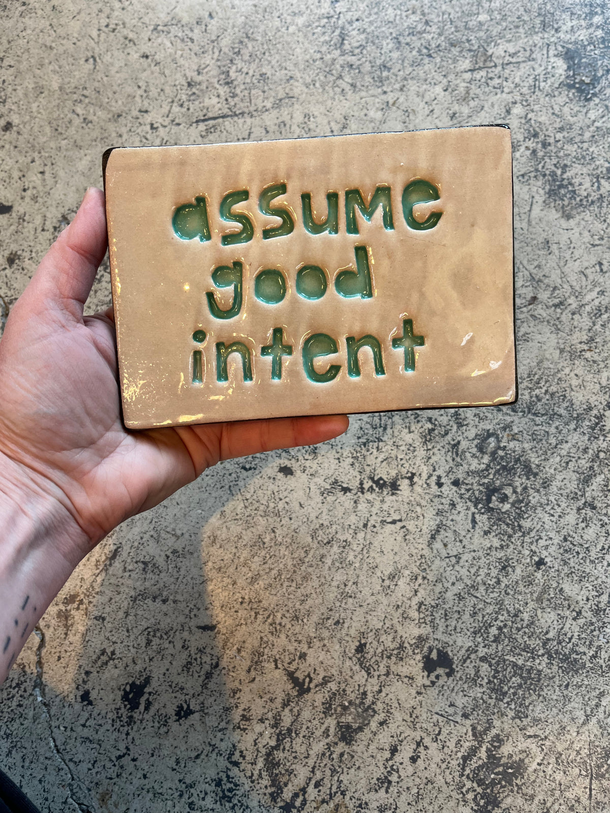 assume good intent tile