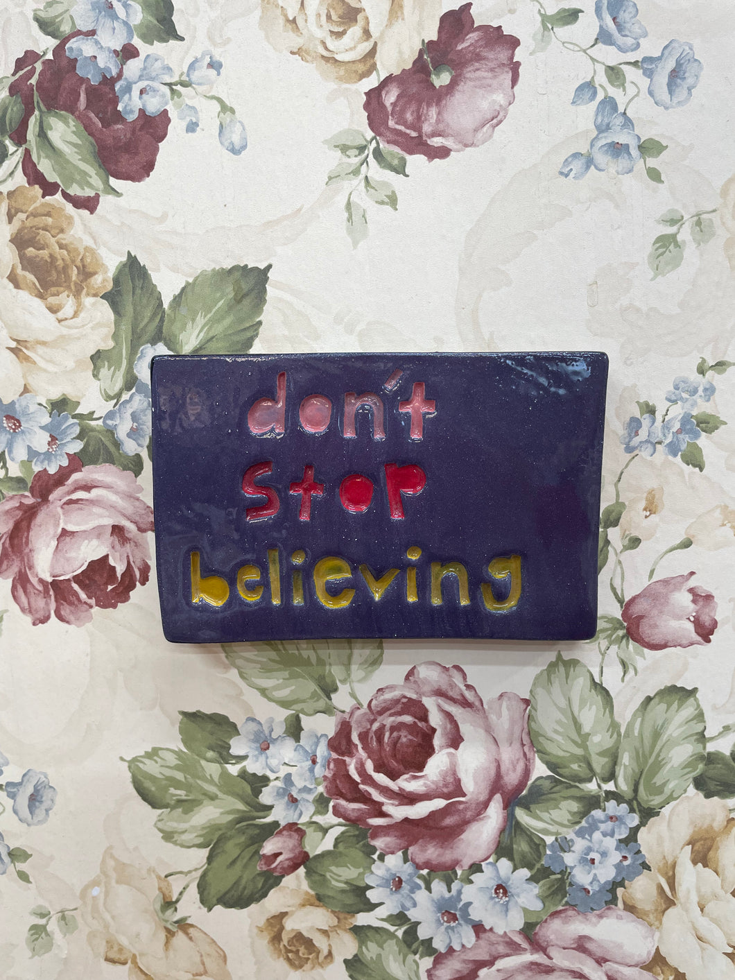 Don’t stop believing tile.