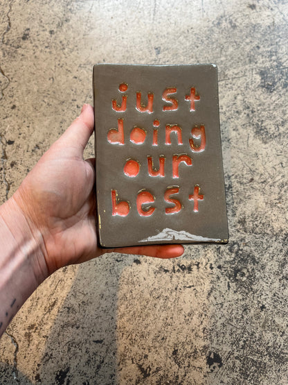 just doing our best tile