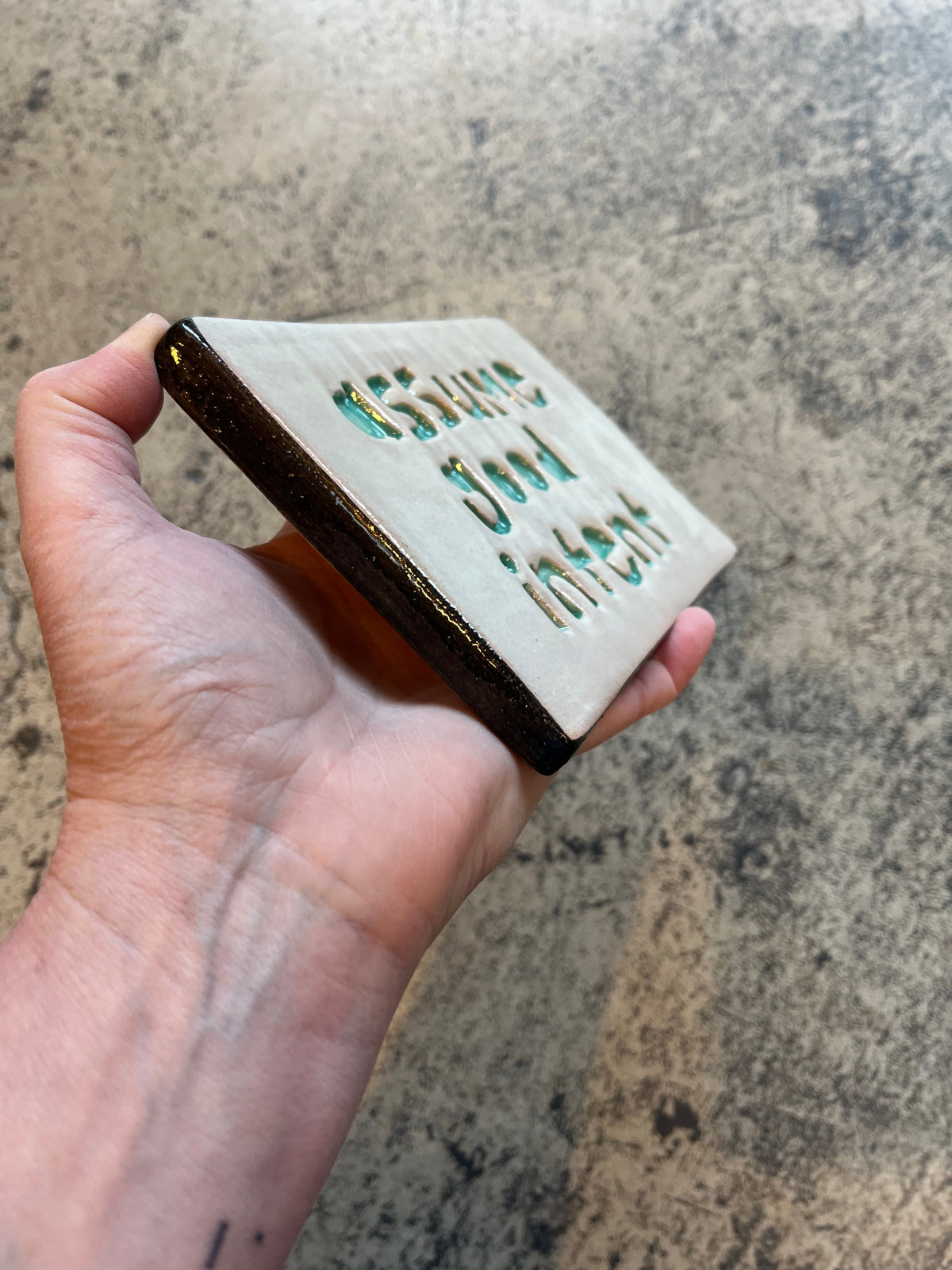 assume good intent tile