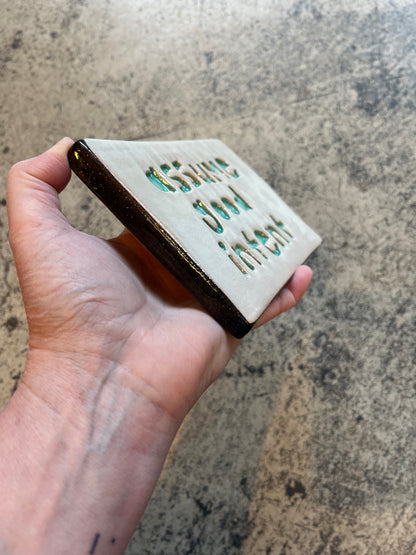 assume good intent tile