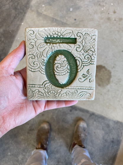 Letter O with tohutō ceramic tile