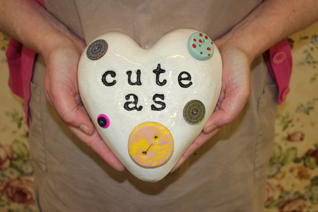Cute as a button wall heart.